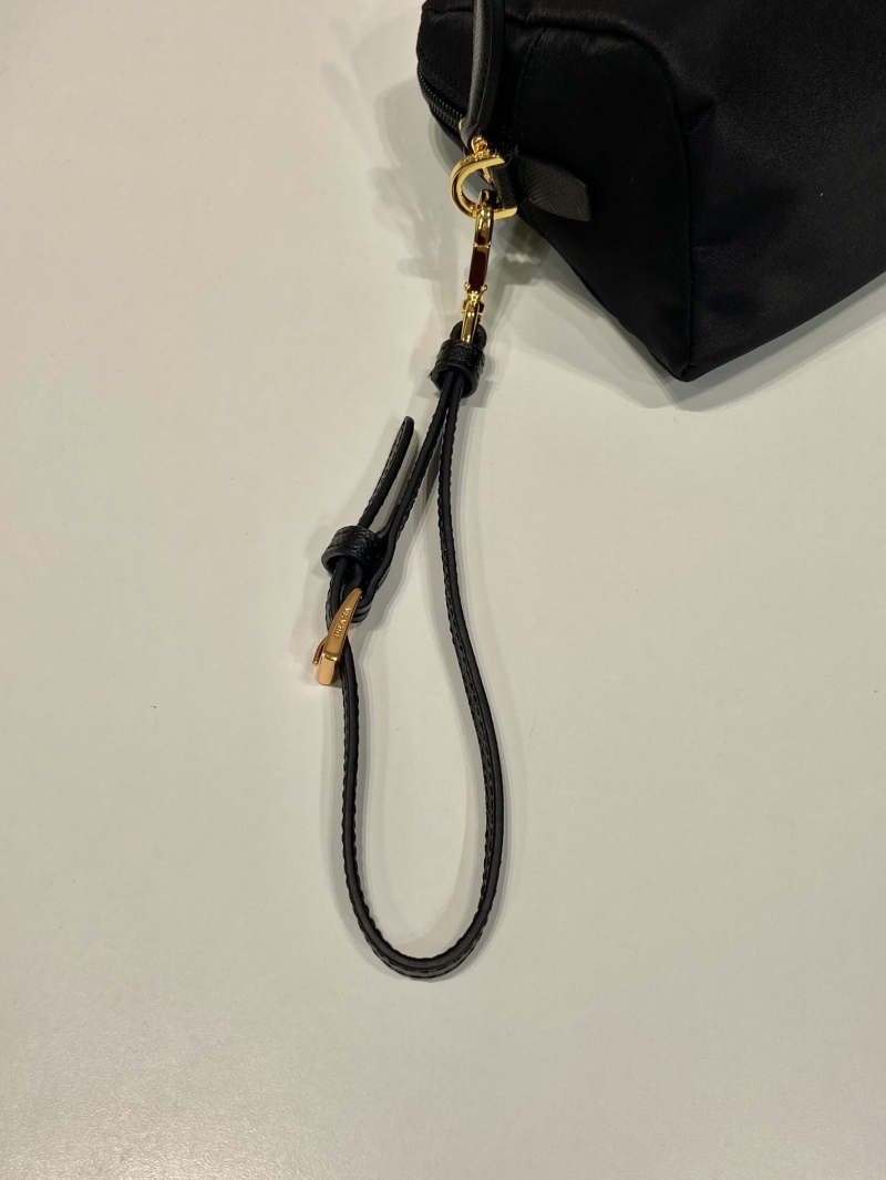 Pra*a clutch bags